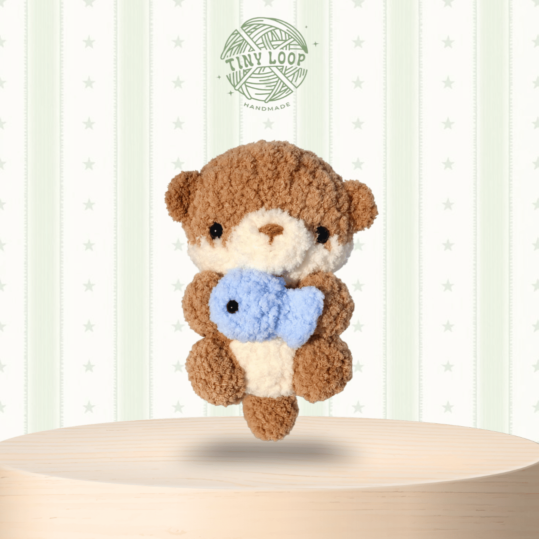 1 mẫu móc khóa len Rái Cá Handmade